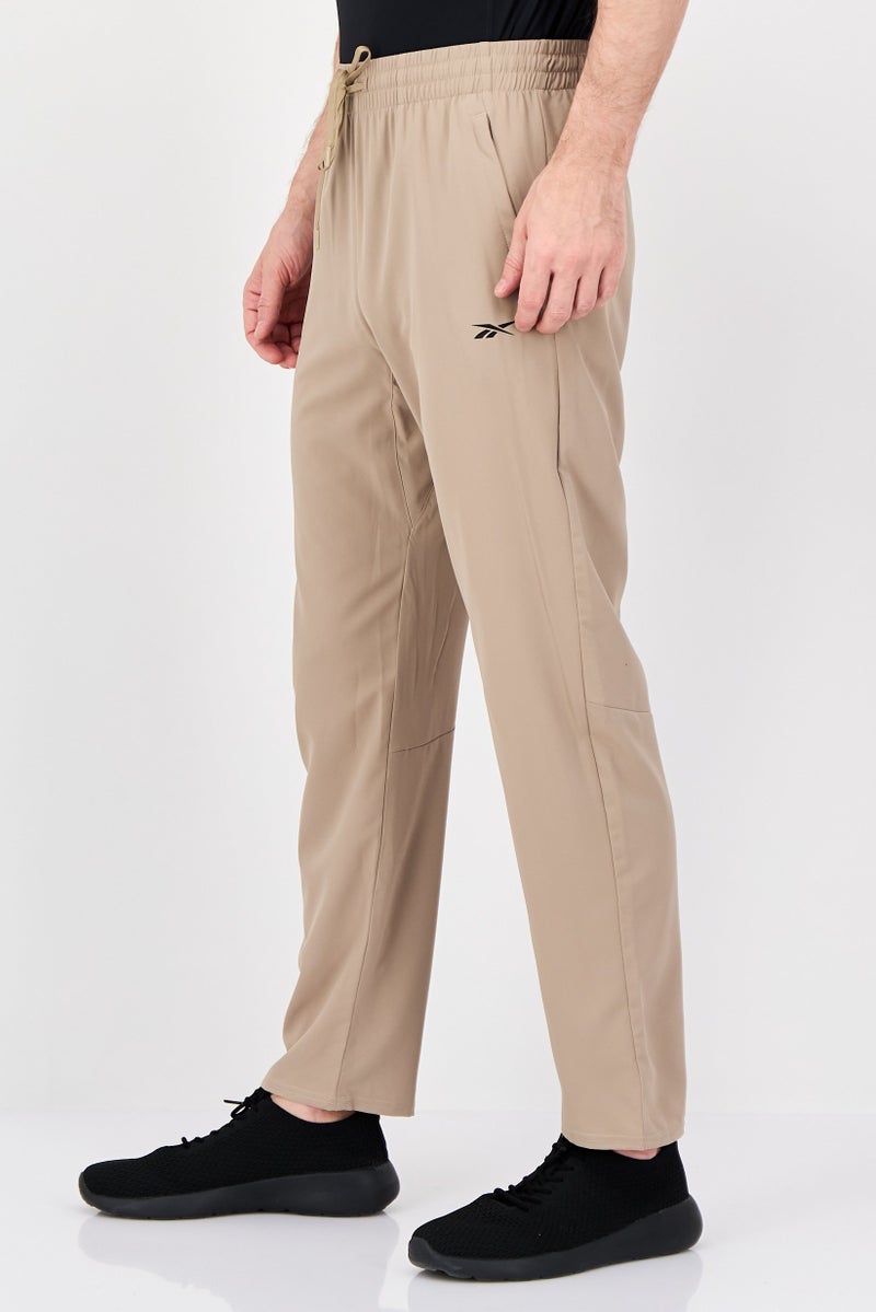 Reebok Men Sportswear Fit Brand Logo Training Track Pants, Tan - Image 4